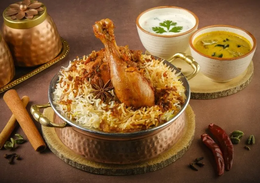Authentic Hyderabadi Chicken Biryani made with aromatic basmati rice and tender chicken at Sri Parimala's Kitchen.